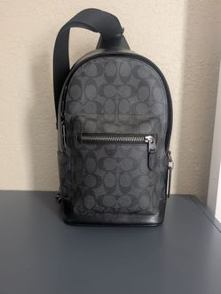 Coach sling bag/ black leather canvas/ universal size
