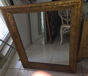 Vintage ornate gold wood framed mirror. Size 30.5"×37", nice carved details, good used condition. $85 firm. Local pickup only, Tamarac 33319.