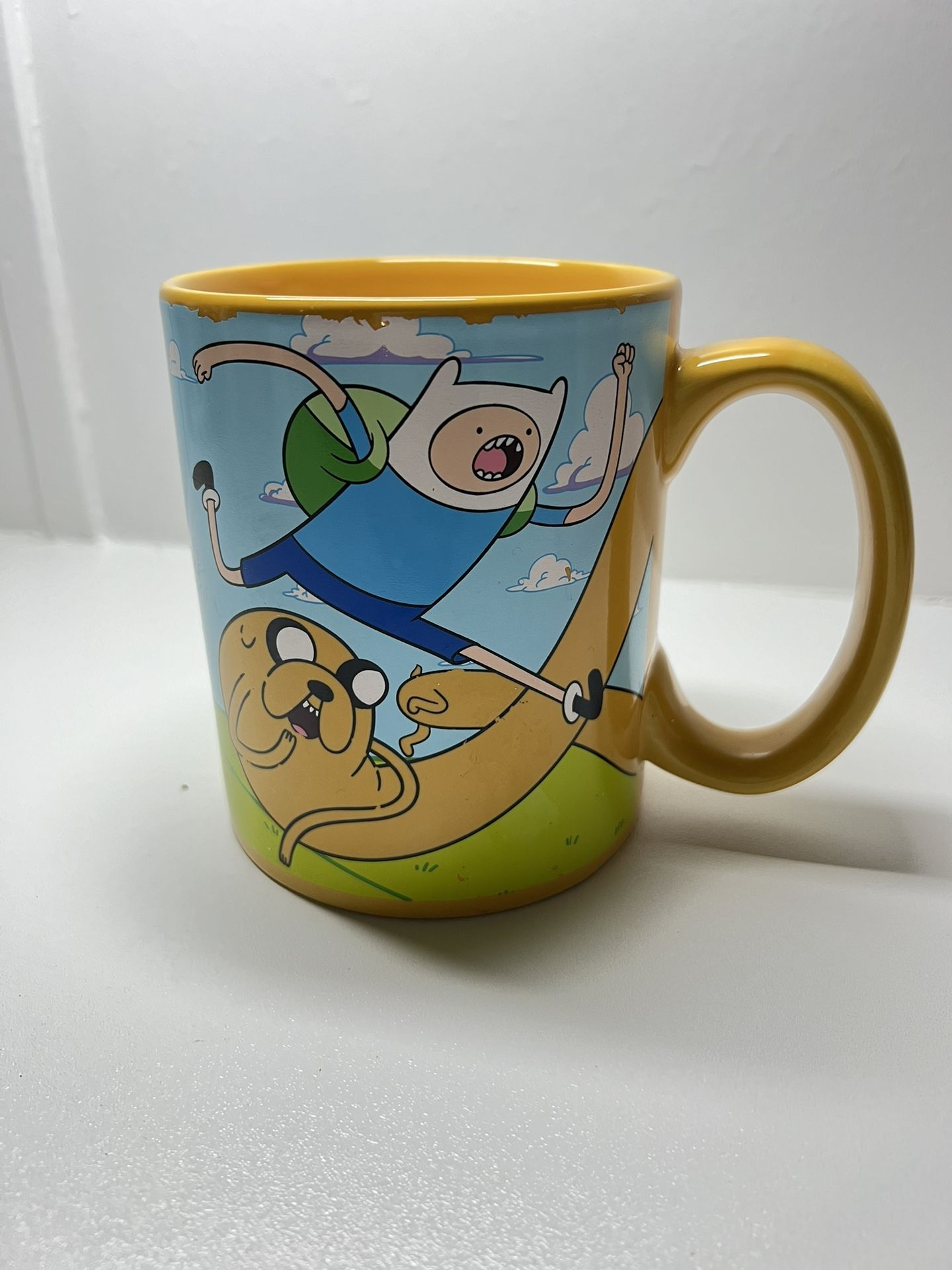 adventure-time-mug-cartoon-network- Clean the cup with alcohol and paint some areas details in photos