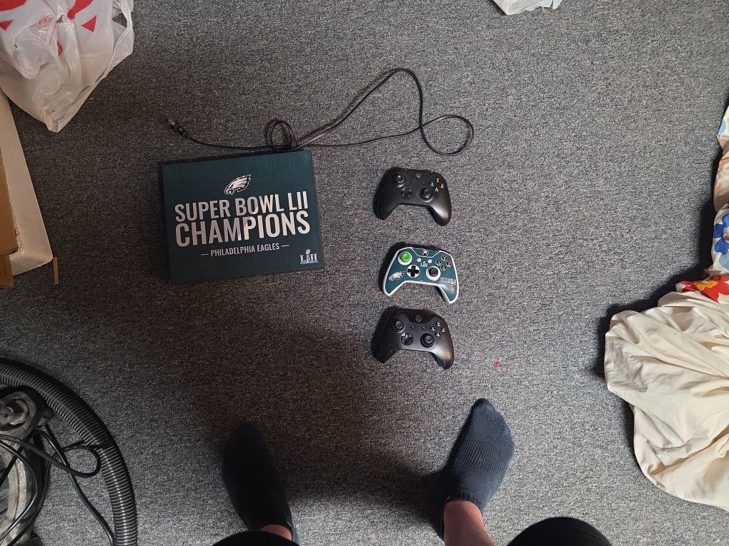 Xbox One X And 3 Controllers