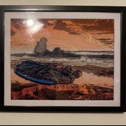 Custom art piece of millennium falcon on black frame