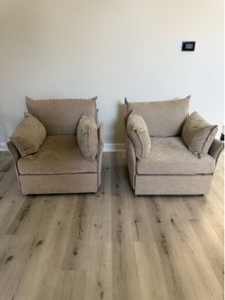 Two accent chairs, turn into one loveseat