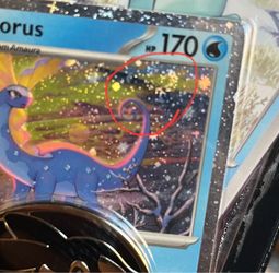 exceptional SWIRL PLACEMENT! Aurorus Cosmos Holo blister
