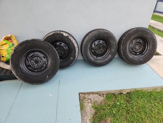 4 unmatched 15's with rims
