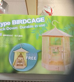 Small bird cage with cloth cover