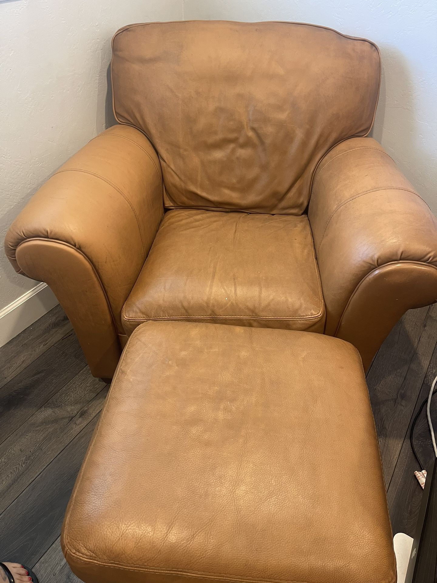 Leather club chair and ottoman