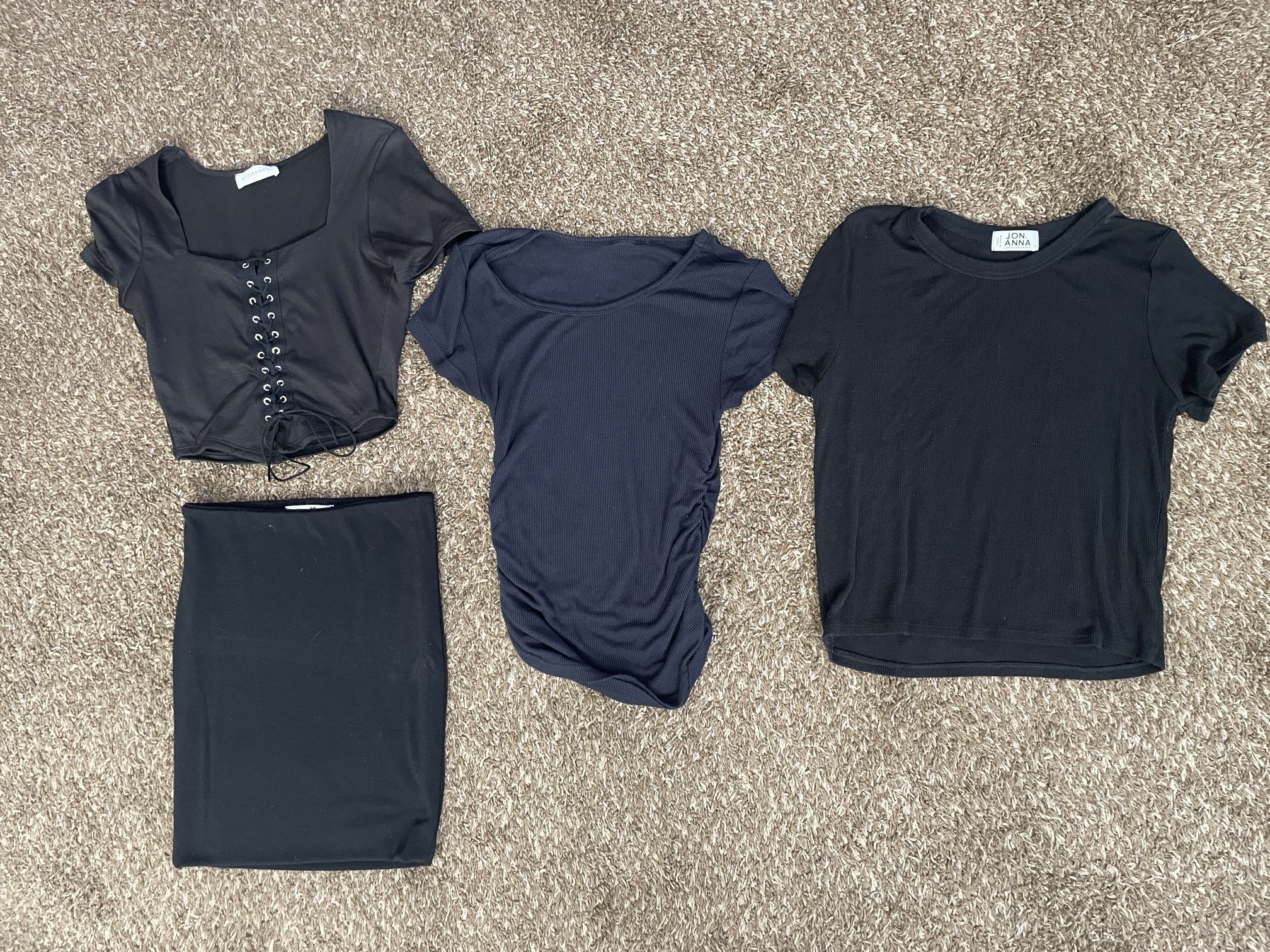 Black tops and skirt