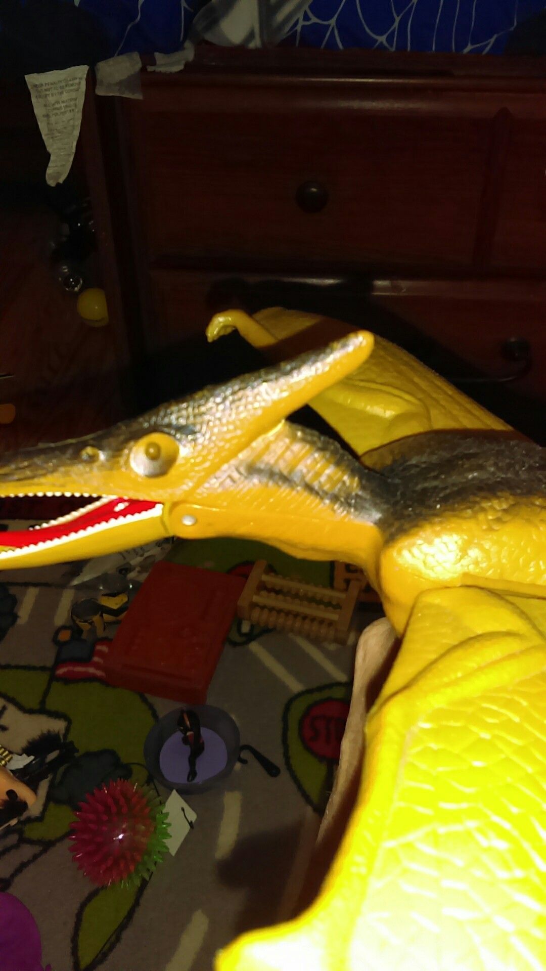 Teradactle dinosaur. Eyes light up.