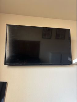 48in Tv with Wall Mount & Amazon Fire Stick Included