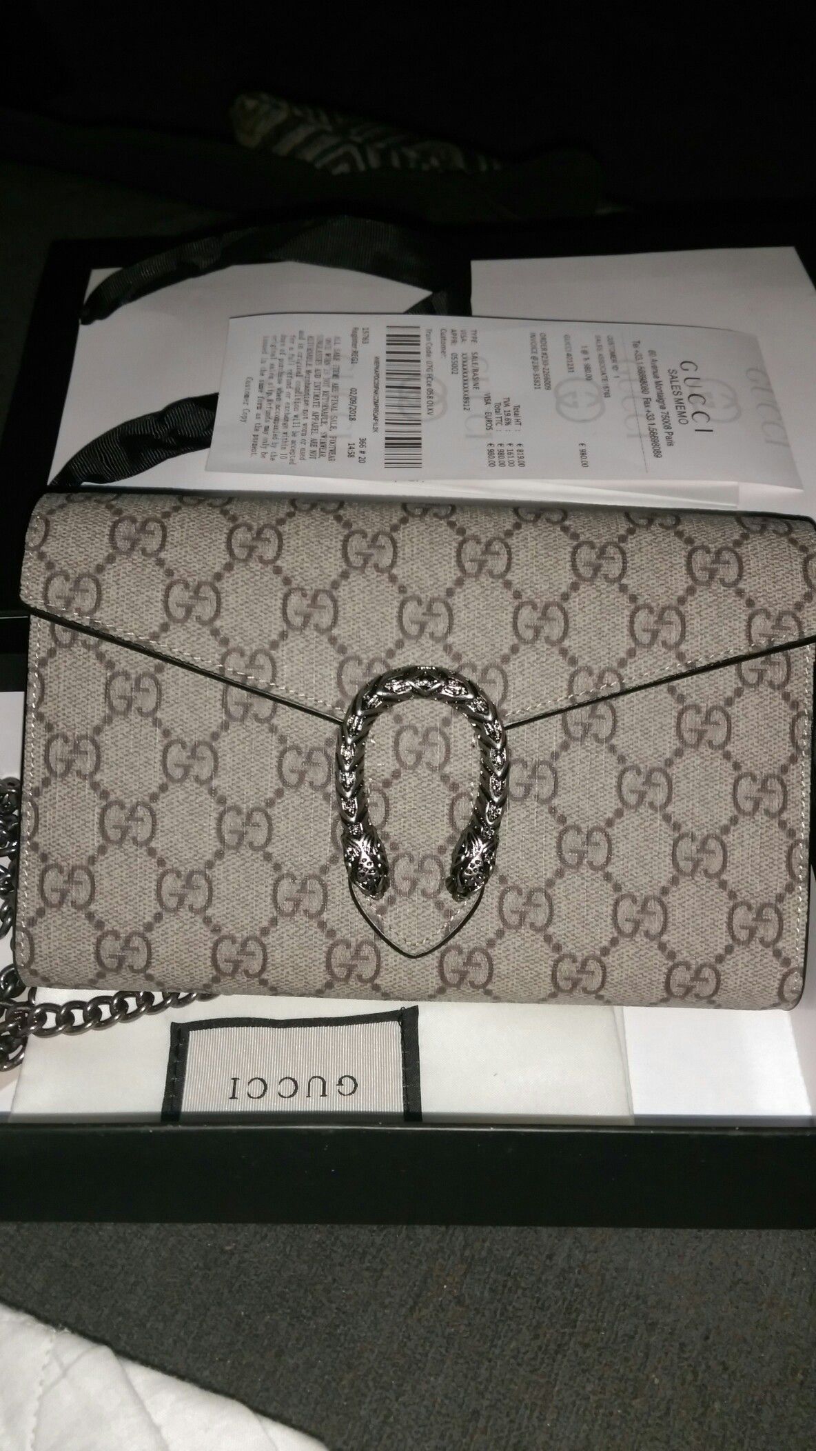 Sold Gucci WOC Dionysus used in good condition.