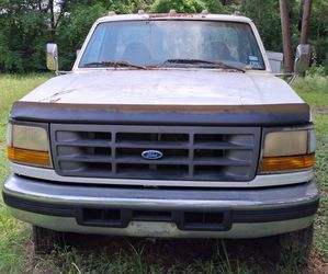 2 Service trucks for trade for a nice car
