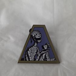 Haunted Mansion mummy puzzle piece
