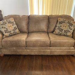Leather Chatter ton Sofa In Earth