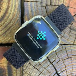 Fitbit Versa 2 Model FB504, bands, and Chargers