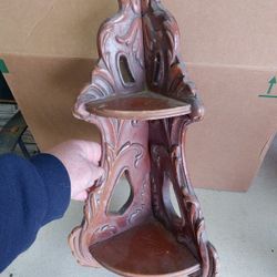 antique-style wooden corner wall shelf. 
