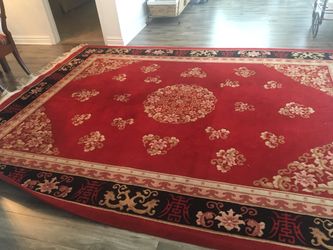 11 x 8 oriental wool fringe rug. Good condition $999.00