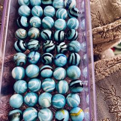 55 Aqua Blue Marbles & 2 Shooters 