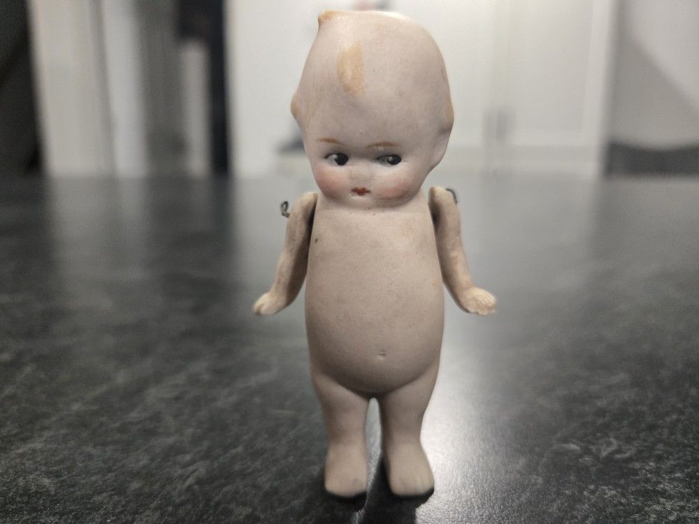 “Early Rare German Kewpie bisque doll, c.1915–1920