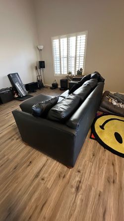 Leather couch Pull out bed with side chair!