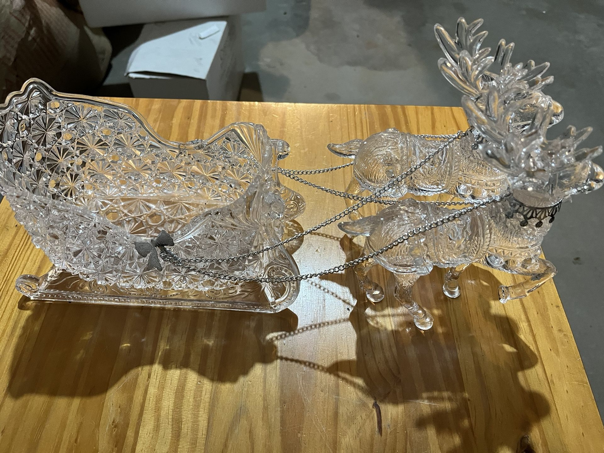 2 Raindeer Pulling A Sleigh. Crystalline