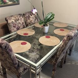 Glass table with 6 chairs