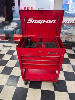 Snap on tools boxes with diagnostic equipment