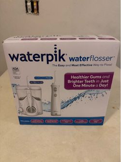 Water pick Delux with cordless flosser