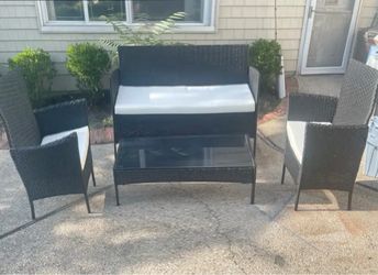 Brand new 4-Piece Rattan Outdoor Patio Furniture Set