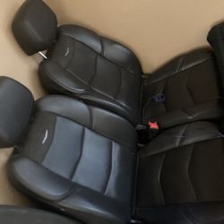 Passanger And Driver Caddilac Seats