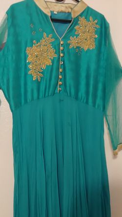 Long blue dress button is missing but can be replaced