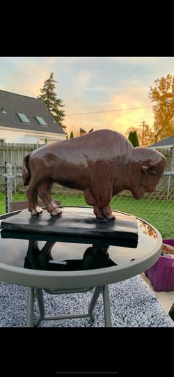 The classic brown buffalo statue
