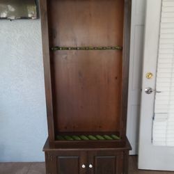 SPORTS CABINET HOLDS UP TO 6ITEMS HAS KEYS FOR BOTTOM CABINET FEW KNICKS NO DOORS PK.UP FT.PIERCE 