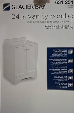 Glacier Bay 24” Vanity Moen Faucet and Hardware Kohler Medicine Cabinet