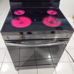Black Stainless Steel Samsung Stove In Good Condition $500