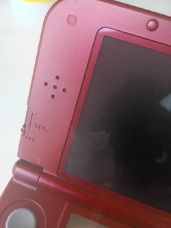 Nintendo 3dxl . ( Needs charger)