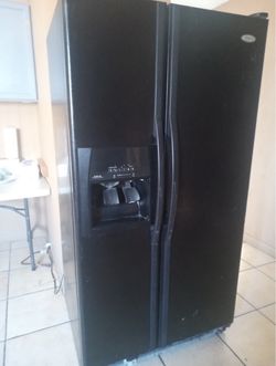 Black fridge. Works perfectly fine. Pickup only