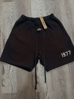 Fear of God Essentials gray 1977 Sweat Shorts