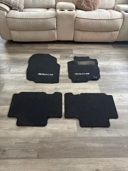 Floor mat set for a 2016–2018 Toyota RAV4.