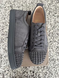 Christian Louboutin , Red bottoms