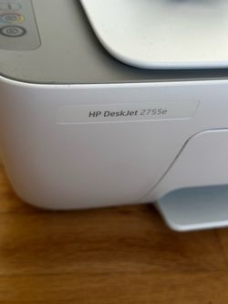 HP Deskjet 2755e printer and scanner with paper