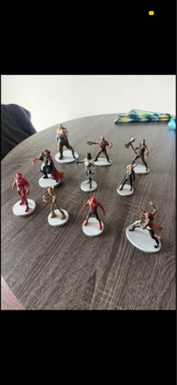 10 figures collection, first person that brings $12 for everything now Costa Mesa