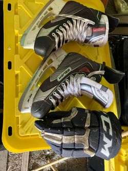 Bauer hockey skates and helmet