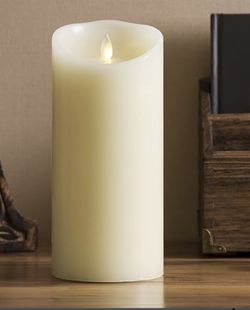 Flickering flameless ivory candle with remote new in box