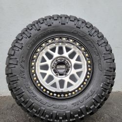 18" KMC rims w/ 34" Nitto Trail Grappler Tires