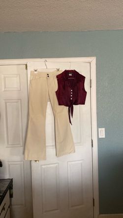 Cute outfit with flared so gsjc jeans and Blake Adams cranberry top size medium