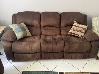 Living room set with couch’s, coffee table, 1 end table, 2 tower lamps and a multicolor 5x7 rug