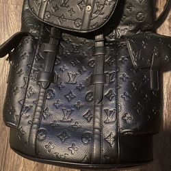 louis vutton book bag