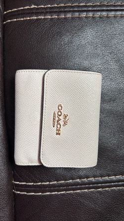 Coach Wallet tan outside and floral design inside