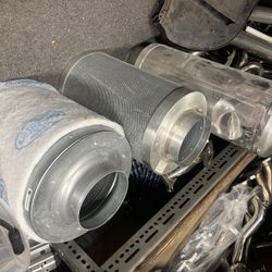 Two small carbon filters, and one exhaust muffler
