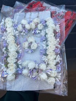 Artificial gajre are beautifully designed floral hair accessories made with high-quality faux flowers that look fresh and elegant all day long. They a